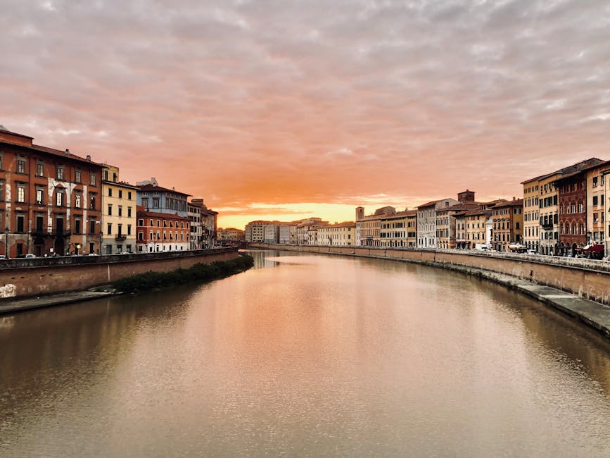 Arno river sunset Pisa reflections