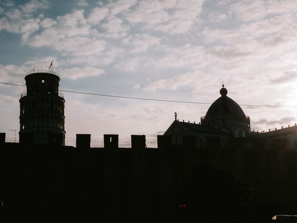 Pisa sunset couple silhouette