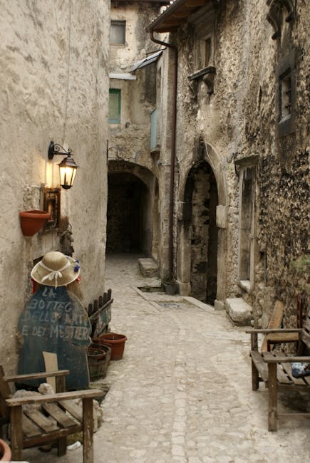 San Gimignano narrow street cobblestones morning light